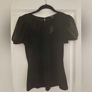 Express ladies short-sleeved blouse. Puffed sleeves,  with a mesh overlay